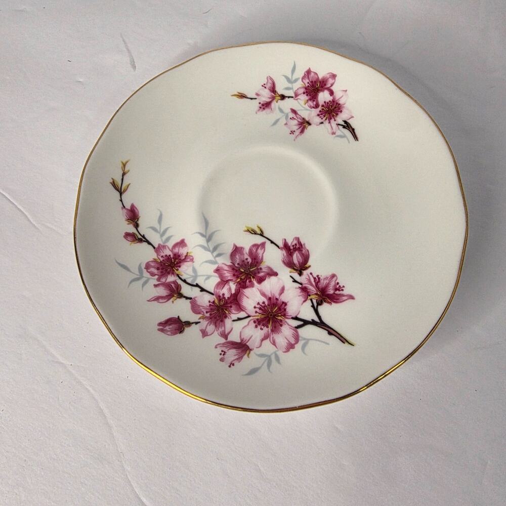 vintage Duchess Bone China teacup saucer cherry blossom pattern and gold trim
